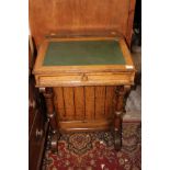 A Victorian Gothic Revival oak Davenport,