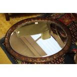 Early 20th Century oak oval mirror,