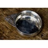 A Chinese silver porringer, engraved with birds and bamboo with openwork handle,