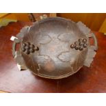 A Black Forest carved wooden musical pedestal fruit bowl, twin handled,