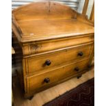 A pine painted chest of drawers with frieze drawer,