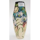 A Moorcroft first quality vase in the 'Snow drops' pattern, in an unusual colourway,