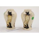 Two miniature Moorcroft first quality vases in the 'Double Trouble' pattern,