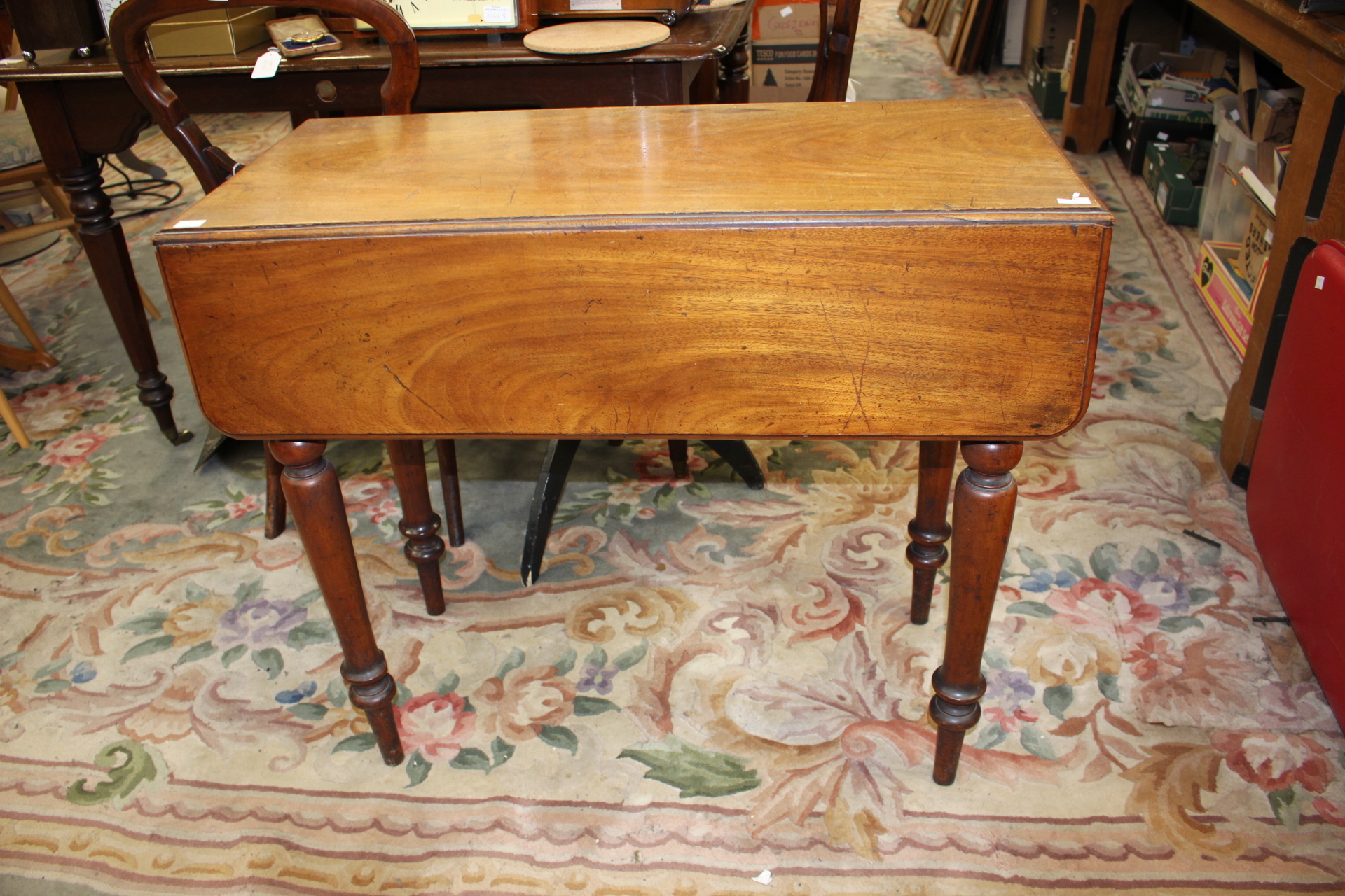 An early Victorian mahogany Pembroke table,