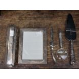 Five silver items, magnifying glass cake slice,