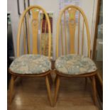 Four Ercol light elm and beech chairs (4)