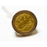 A 1914 half sovereign ring, 9ct shank, combined weight approx 11.