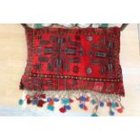 A bright red Persian cushion number 256