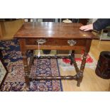 A late 17th Century oak joined side table with drawer