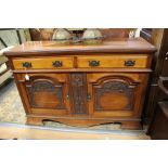 An Edwardian mahogany sideboard