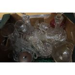 A collection of Georgian and Victorian glass to include decanters, drinking glasses,