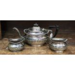 Silver plated three piece tea service, comprising tea pot,