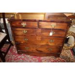 A George III mahogany chest of drawers, fitted with two short over three long graduated drawers,