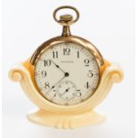 A 9ct gold plated Waltham slim pocket watch and cream stand