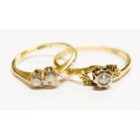An 18ct gold and diamond solitaire ring, with fancy engraved shoulders, size T 1/2,