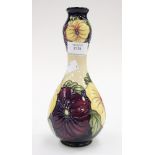 A Moorcroft trial double gourd vase in the 'Pansy' pattern, dated to the base 9-9-12,