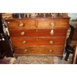 A George III mahogany chest of drawers,