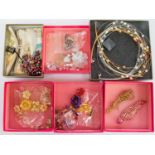 A collection of Butler and Wilson costume jewellery, rhinestone type, necklaces, pearls,