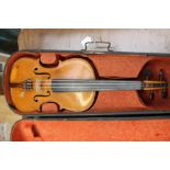 A violin, unlabelled, length of back 14 1/8",