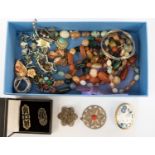 A collection of costume jewellery, to include an Art Deco enamel and paste brooch,