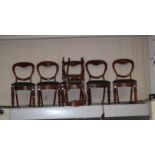 A set of six Victorian mahogany balloon back chairs,