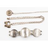 A collection of silver comprising a Victorian silver coin bracelet,