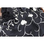 A black silk shawl,