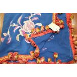 A navy blue ground, thick silk thread embroidered cover with dragon figures, birds etc,