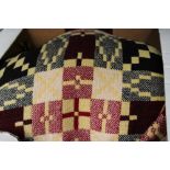 A large Welsh wool geometrical shawl blanket 1960s in shades of yellow, red, black, cream,