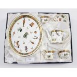 A boxed Royal Crown Derby 'Treasures of Childhood' miniature tea service (1)