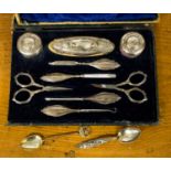 A ladies manicure set with filled silver handles to four implements, two pairs of scissors,