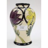 A Moorcroft first quality limited edition 11/30 vase in the 'Wild Flowers' pattern in a cream