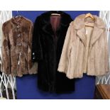 A faux fur gold jacket 1980, a faux fur black coat 1960's,