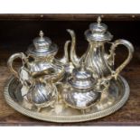 A German made silver plated tray, milk jug, sugar pot and tea and coffee pots.