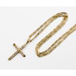 A 9ct gold Figaro chain, along with a paste cross, with a gross total weight 16.