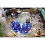 A box of glassware to include a mirrored tray with etched image,