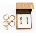 Four pairs of gold earrings,