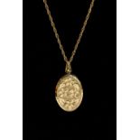 A 9ct gold photo locket, oval in form and 9ct gold chain; together with a broken 9ct gold chain,