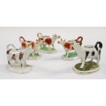 Five various Staffordshire early 19th Century cow creamers to include Sponge ware,