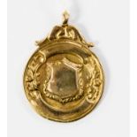 A 9ct gold fob by Collins of London with a weight of approx 9.