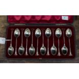 A set of twelve Victorian silver teaspoons, stylised Onslow pattern with stylised shell shaped bowl,