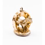 A gold seal (stamped 10ct), in the form of horseshoe cast with horse and set with an agate,