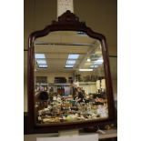 A Victorian shield shaped mirror