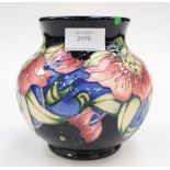 A Moorcroft first quality bulbous vase in the 'Anna Lily' pattern, in an unusual colourway,