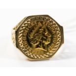 A 9ct ring, set with a Half Sovereign, weighing approx 9.