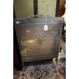 A metal Art Deco fire screen with geometric design to top and front (1)