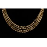 A 9ct gold Muff or Guard chain, with toggle fastener, with a total length of approx 62'',