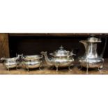 A George V silver four piece tea & coffee service, plain Georgian style with gadroon rim,