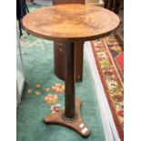 A mahogany quarter veneered pedestal table with walnut crossbanding,