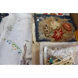 Three boxes of textiles including a Victorian embroidered bedspread,